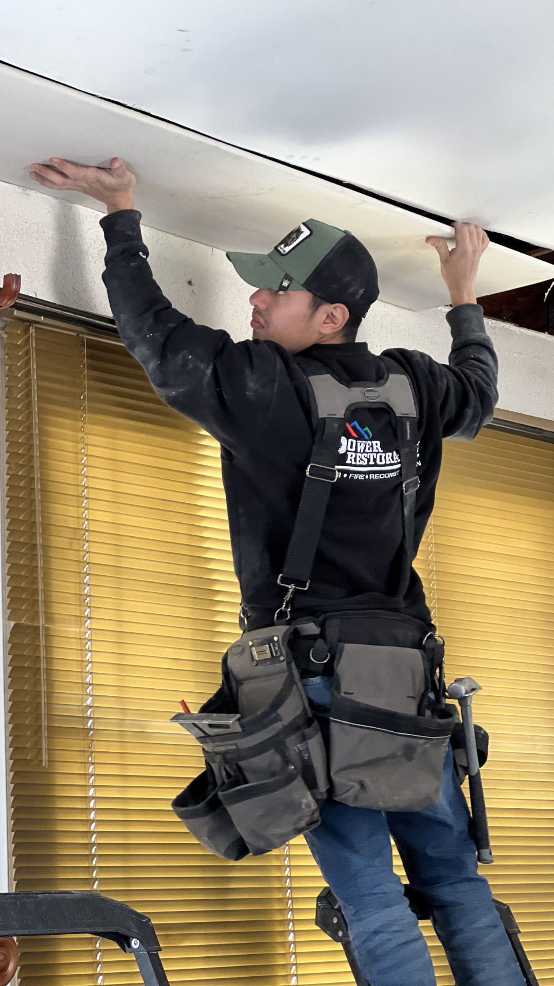 Power Restoration of Rockfordtechnician performing structural mitigation and reconstruction work during a residential property restoration project.