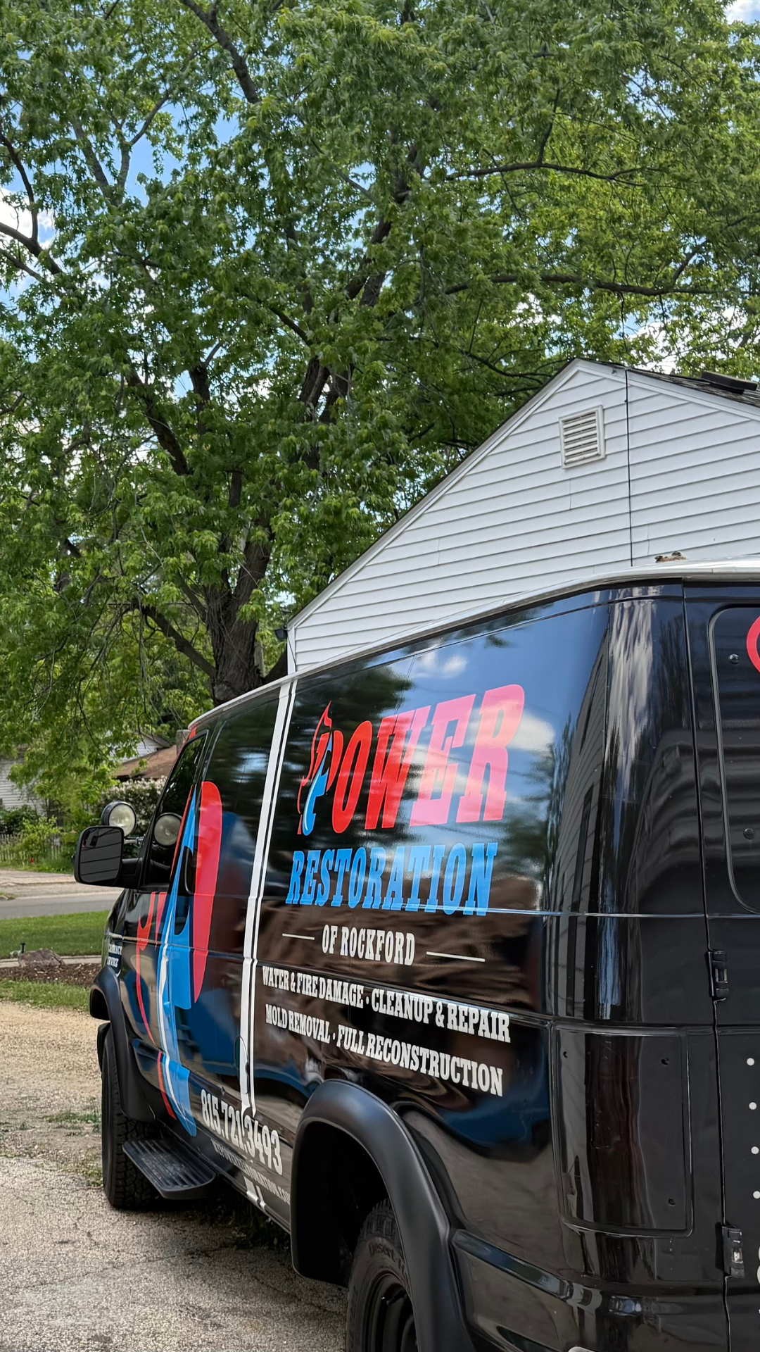 Power Restoration service vehicle parked at a residential property while responding to a customer restoration project in Northern Illinois.